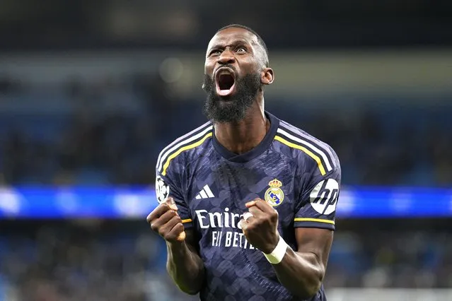 Real Madrid's Antonio Rudiger celebrates at the end of the Champions League quarterfinal second leg soccer match between Manchester City and Real Madrid at the Etihad Stadium in Manchester, England, Wednesday, April 17, 2024. (Photo by Dave Shopland/AP Photo)