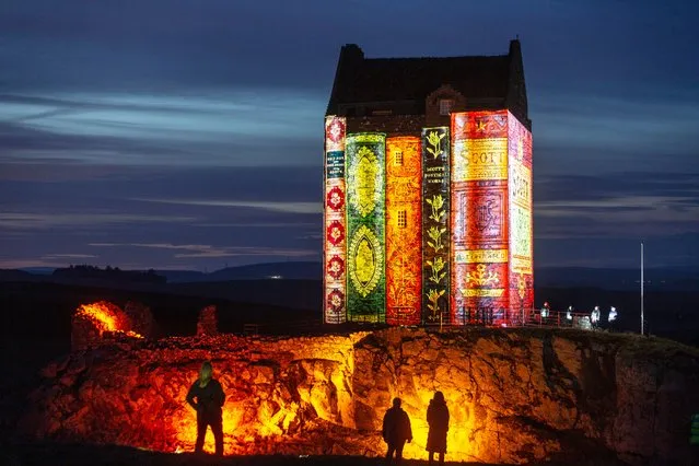 Smailholm Tower, near Kelso in the Scottish Borders, is lit up by the world premiere of a brand-new short film “Young Scott” created by video artist Andy McGregor, to launch the international celebrations for the 250th anniversary of the life and works of Sir Walter Scott on Wednesday March 17, 2021. (Photo by Murdo MacLeod/The Guardian)
