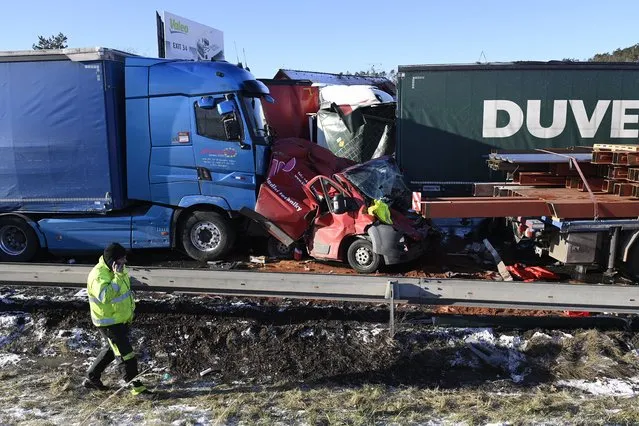 Six people were injured in a crash of 36 vehicles on a highway D5 near Zebrak in Beroun Region, Czech Republic, on Thursday, January 20, 2022. The police is investigating the cause of the accident, bad weather is being taken into account. (Photo by Ondrej Deml/CTK via AP Photo)