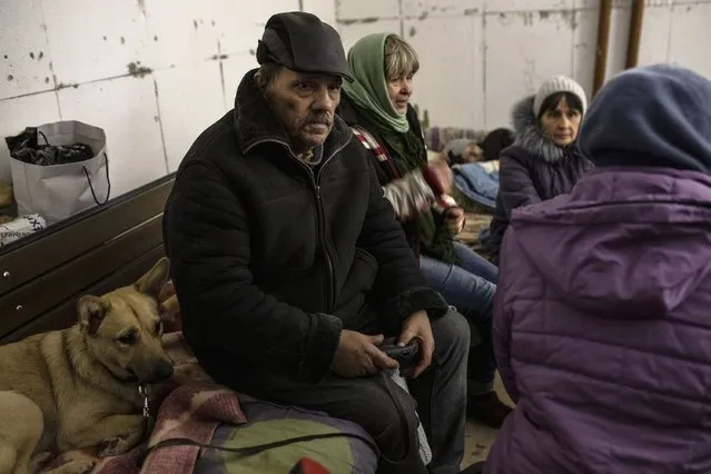 Residents of the Ukrainian city of Irpin inside an underground shelter on March 10,2022. (Photo by Heidi Levine for The Washington Post)