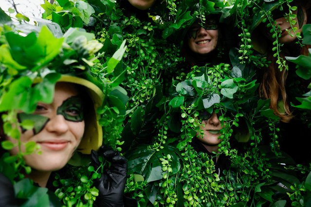 Performers pose on the day of the St. Patrick's Day parade in Dublin, Ireland on March 17, 2023. (Photo by Clodagh Kilcoyne/Reuters)