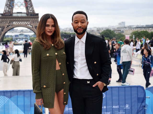 American singer-songwriter John Legend and his wife, American model Chrissy Teigen arrives at the Trocadero ahead of the opening ceremony for the Paris 2024 Olympic Games on Friday, July 26, 2024. (Photo by Christophe Petit Tesson/Pool via PA Wire)