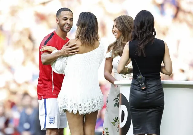 Britain Football Soccer, England XI v Rest of the World XI, Soccer Aid 2016, Old Trafford on June 5, 2016. England XI's Marvin Humes with his wife Rochelle, TV Personality Vicky Pattison and presenter Kirsty Gallacher before the match. (Photo by Ed Sykes/Reuters/Action Images/Livepic)