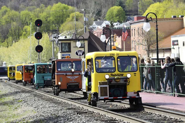 Railroad speeders driven by members of the North American Railcar Operators Association arrive at the Tamaqua Train Station in Tamaqua, Pa., for a stop, Sunday, May 1, 2022. (Photo by Jacqueline Dormer/Republican-Herald via AP Photo)