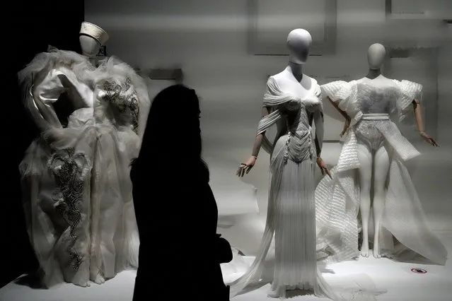 A woman visits France pavilion at the Dubai Expo 2020 in Dubai, United Arab Emirates, Thursday, March 31, 2022. The world's fair in Dubai, the pandemic-delayed Expo 2020, closed on Thursday after six months of concerts, conferences and festivities. (Photo by Ebrahim Noroozi/AP Photo)