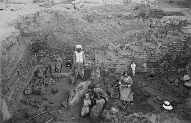 The Garstang Museum in Liverpool has recently 3D-printed copies of various artefacts found at Meroë. Here: Garstang and his wife Marie examining statue fragments in the tank at the “Royal Baths”, 1913. (Photo by Garstang Museum of Archaeology)