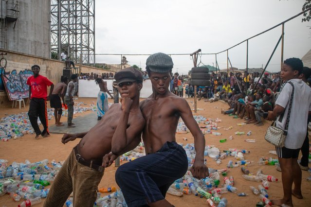 Artists perform during a slum party in Oworonshoki district of Lagos, Nigeria, 24 September, 2024. The slum party is a yearly artistic dance festival initiated by Ennovate Dance House. It highlights the positive sides of the slum community and brings hope to the inhabitants. (Photo by Emmanuel Adegboye/EPA/EFE)