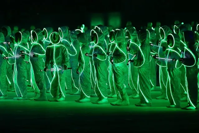 Entertainers perform on stage during the National Day Parade at Padang on August 9, 2015 in Singapore. Singapore is celebrating her 50th year of independence on August 9, 2015. (Photo by Suhaimi Abdullah/Getty Images)