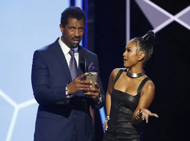 Presenters Deon Cole and Karrueche Tran perform a comedy bit at the 2016 BET Awards in Los Angeles, California, U.S., June 26, 2016. (Photo by Danny Moloshok/Reuters)