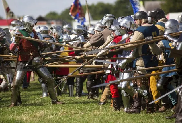Historical re-enactors re-create the Battle of Tewkesbury as part of an anniversary event for the Battle of Bosworth near Market Bosworth in central Britain August 22, 2015. (Photo by Neil Hall/Reuters)