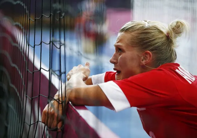 Denmark's Ann Grete Norgaard cries after their loss to Norway in their women's handball Preliminaries Group B match at the Copper Box venue during the London 2012 Olympic Games August 3, 2012. (Photo by Marko Djurica/Reuters)