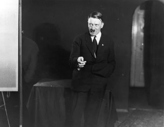 1925:  Hitler posing to a recording of one of his speeches after his release from Landsberg Prison. (Photo by Heinrich Hoffmann/Keystone Features)