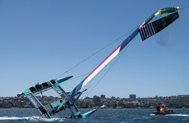 The USA SailGP team’s F50 catamaran is recovered by a support crew after it capsized during a training session in Sydney, Australia on February 7, 2025. (Photo by Ricardo Pinto/AP Photo)