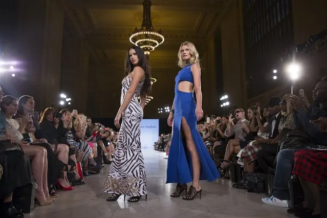 Models Adriana Lima and Toni Garrn present creations from Carmen Steffens during the FTL Moda presentation of the Spring/Summer 2016 collection during New York Fashion Week in Vanderbilt Hall at Grand Central Station, New York, September 13, 2015. (Photo by Andrew Kelly/Reuters)