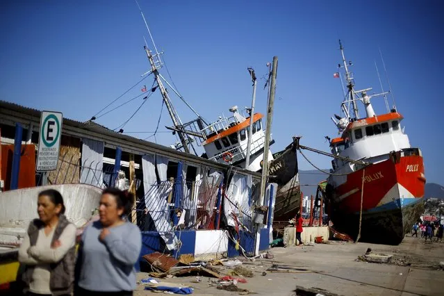 Ships are seen on the street after an earthquake hit areas of central Chile, in Coquimbo city, north of Santiago, Chile, September 17, 2015. (Photo by Ivan Alvarado/Reuters)