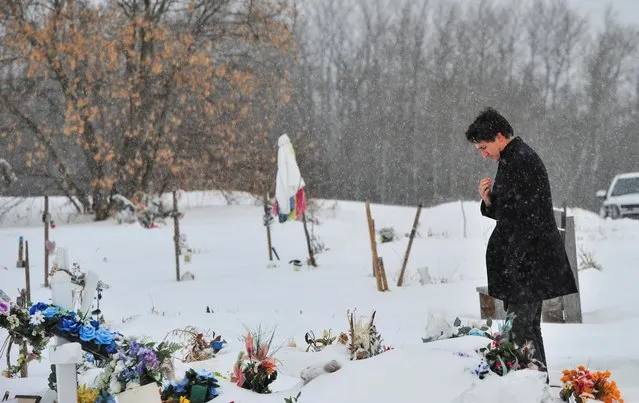 Canada's Prime Minister Justin Trudeau pays his respects to the victims of a September stabbing spree at the James Smith Cree Nation, Saskatchewan, Canada on November 28, 2022. (Photo by Nayan Sthankiya/Reuters)