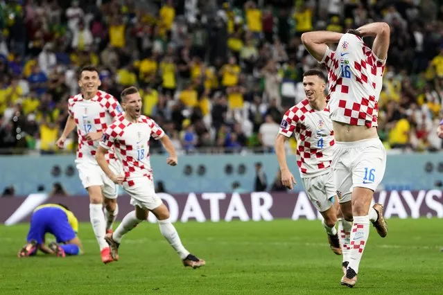 Croatia's Bruno Petkovic celebrates scoring his side's opening goal during the World Cup quarterfinal soccer match between Croatia and Brazil, at the Education City Stadium in Al Rayyan, Qatar, Friday, December 9, 2022. (Photo by Manu Fernandez/AP Photo)