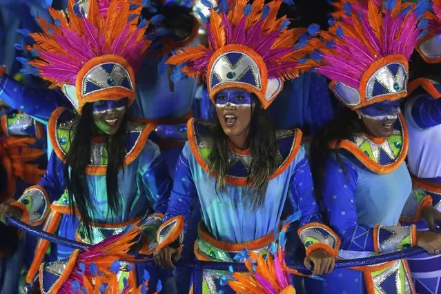 Revellers of Portela samba school participate in the annual Carnival parade in Rio de Janeiro's Sambadrome February 11, 2013. (Photo by Ricardo Moraes/Reuters)