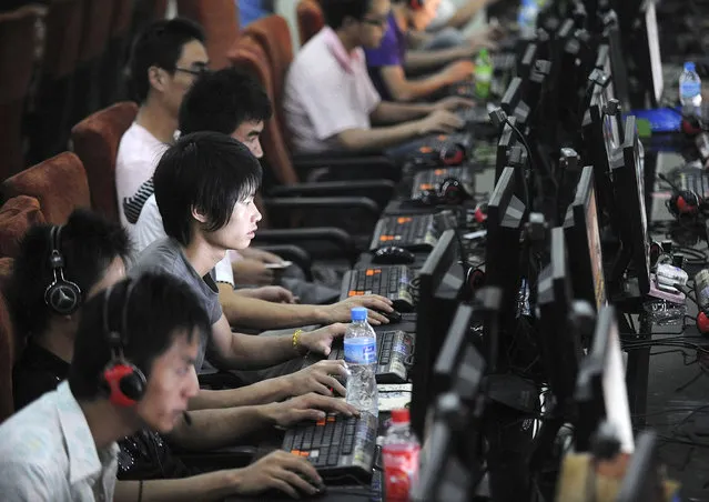 Customers at an internet cafe in Hefei, Anhui province. (Photo by Jianan Yu/Reuters)
