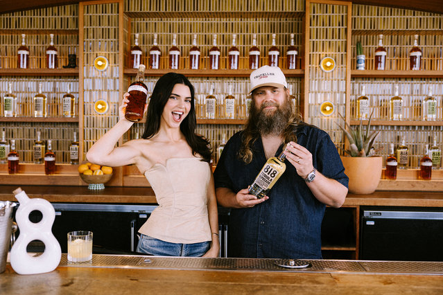 Kendall Jenner and country star Chris Stapleton on July 23, 2025 toast to National Tequila Day by shaking up classic whiskey cocktails with 818 Tequila and Traveller Whiskey at Desert 5 Spot in Los Angeles. (Photo by Andy Barron for 818 Tequila & Traveller Whiskey)