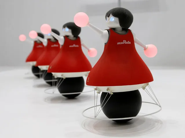 Japan's Murata Manufacturing Co. Ltd's latest concept robots, the “Murata Cheerleaders”, demonstrate how they balance on balls and synchronise as a team by utilising sensing and communication technology, at CEATEC (Combined Exhibition of Advanced Technologies) JAPAN 2016 at the Makuhari Messe in Chiba, Japan, October 3, 2016. (Photo by Toru Hanai/Reuters)