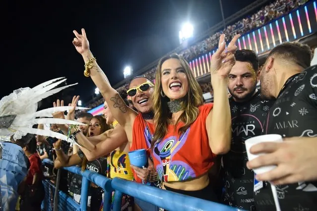 Brazilian-American model Alessandra Ambrosio joins the excitement at Rio's Carnival, channeling the city's electrifying energy in a dazzling ensemble alongside a friend who's clearly loving every moment of the colorful celebration in Rio De Janeiro, Brazil on February 21, 2023. (Photo by Backgrid USA)