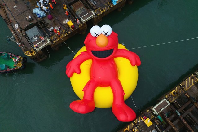 An aerial photograph showing large inflatable Elmo Sculpture at a ship yard on September 20, 2025 in Hong Kong on September 20, 2025. (Photo by Vernon Yuen/Nexpher Images via ZUMA Press Wire/Alamy Live News)