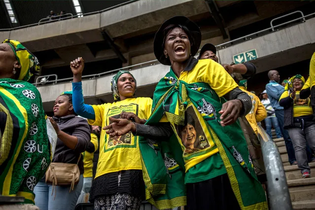 The crowd sing and dance before the start of the Memorial Service for Winnie Mandela at The Orlando Stadium on April 11, 2018, in Soweto, South Africa. The former wife of the late South African President Nelson Mandela and anti-apartheid campaigner Winnie Mandela passed away on April 2, 2018 in Johannesburg. Victor Dlamini, spokesman for the Mandela family said she died after a long illness and succumbed peacefully in the early hours of Monday afternoon surrounded by her family and loved ones. (Photo by Charlie Shoemaker/Getty Images)
