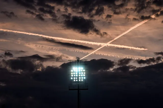 Light column with cloudy evening sky  during the UEFA Europa League Group F soccer match between Slovan Liberec and SC Braga at U Nisi arena in Liberec, Czech Republic, 17 September 2015. (Photo by Filip Singer/EPA)