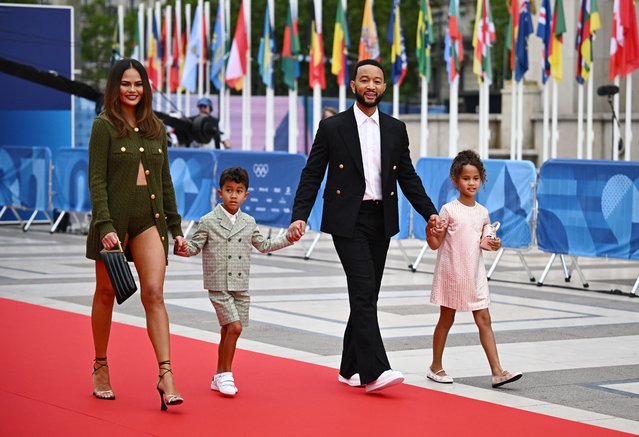 American singer-songwriter John Legend, his wife, American model Chrissy Teigen and their children arrives at the Trocadero ahead of the opening ceremony for the Paris 2024 Olympic Games on Friday, July 26, 2024. (Photo by Dylan Martinez/Reuters)