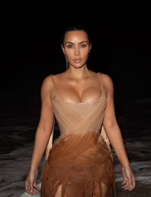 American media personality Kim Kardashian in the last decade of November 2025 went for a night-time dip in a haute-couture dress by the late Alexander McQueen. (Photo by Tomás Herold/@tomasherold)