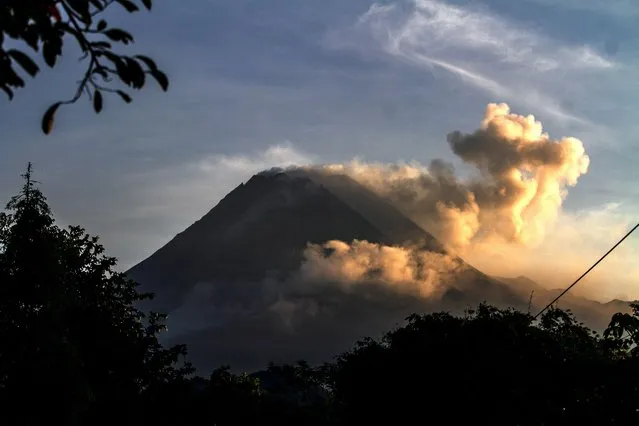 Mount Merapi, Indonesia's most active volcano, spews hot smoke as seen from Sleman, Yogyakarta on April 9, 2023. (Photo by Devi Rahman/AFP Photo)
