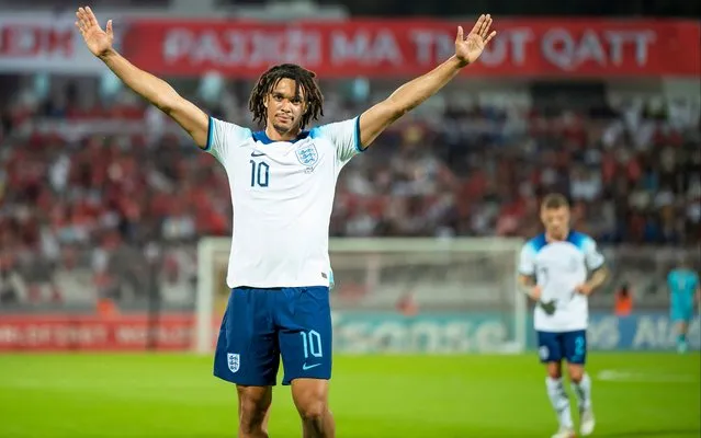 England's Trent Alexander Arnold celebrates after scoring his side's second goal during the Euro 2024 group C qualifying soccer match between Malta and England at the National stadium in Ta' Qali, near Valletta, Malta, Friday, June 16, 2023. (Photo by Rene Rossignaud/AP Photo)