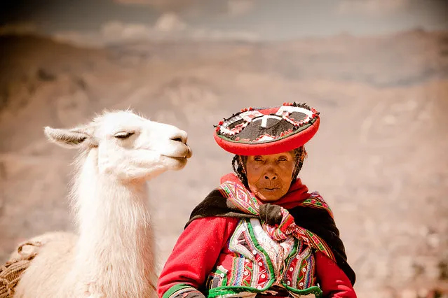 “A Peruvian Woman and her Lama”. I LOVE when people look like their pets. This Peruvian Woman was trying to make money by posing for tourists with her pet Llama at Sacsayhuamán, Ruins, Cusco, Peru. (Photo and caption by Laura Grier/National Geographic Traveler Photo Contest)