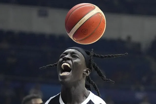South Sudan center Deng Acuoth reacts after scoring against Angola during their Basketball World Cup classification match at the Araneta Coliseum in Manila, Philippines on Saturday September 2, 2023. (Photo by Aaron Favila/AP Photo)
