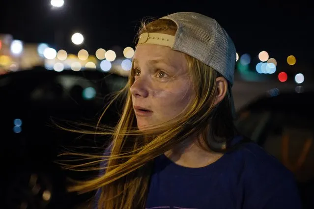 Elizabeth Nelson, 17, waits in the parking lot of Home Depot waiting for her friends after watching their team their first football game of the season, Aug. 25,  2017, Omaha, Nebraska. Nelson enlisted to the army the summer before her senior year of high school, and will ship out to boot camp three days after she graduates. “I feel like Omaha is not really the place for me. So, I definitely want to move out West if anything. I do kind of want to get the hell out of here”. (Photo by Sarah Blesener)
