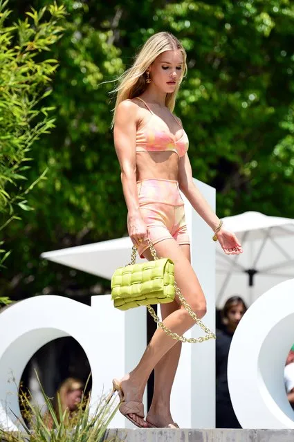 Joy Corrigan is seen on June 24, 2021 in Los Angeles, California. The 26-year-old American supermodel wore a peach bra and matching shorts with a bright yellow handbag in LA for the Alo Yoga do. (Photo by The Mega Agency)