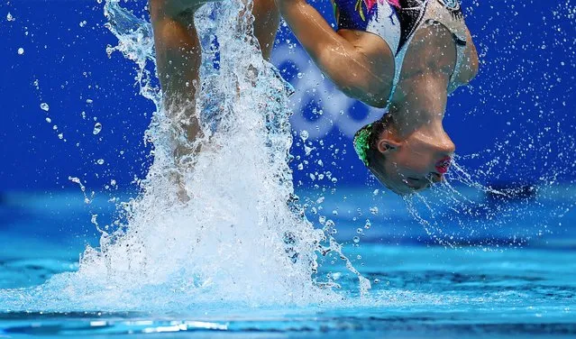 A member of the Israel duet competes in the preliminary for the women's duet free artistic swimming event during the Tokyo 2020 Olympic Games at the Tokyo Aquatics Centre in Tokyo on August 2, 2021. (Photo by Marko Djurica/Reuters)