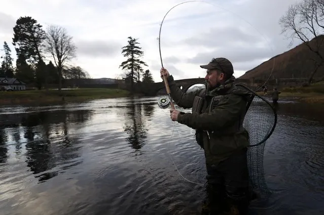 An angler fishes on the opening day of the salmon fishing season on the River Tay at Kenmore in Scotland, Britain January 16, 2017. (Photo by Russell Cheyne/Reuters)