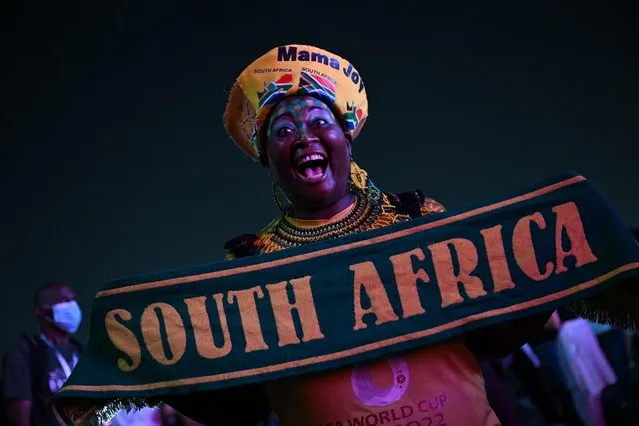 A South African supporter attends the FIFA Fan Festival opening day at Al Bidda park in Doha on November 19, 2022, ahead of the Qatar 2022 World Cup football tournament. (Photo by Glyn Kirk/AFP Photo)