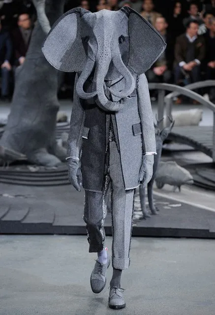 A model walks the runway during the Thom Browne Menswear Fall/Winter 2014-2015 show as part of Paris Fashion Week on January 19, 2014 in Paris, France. (Photo by Kristy Sparow/Gamma-Rapho via Getty Images)