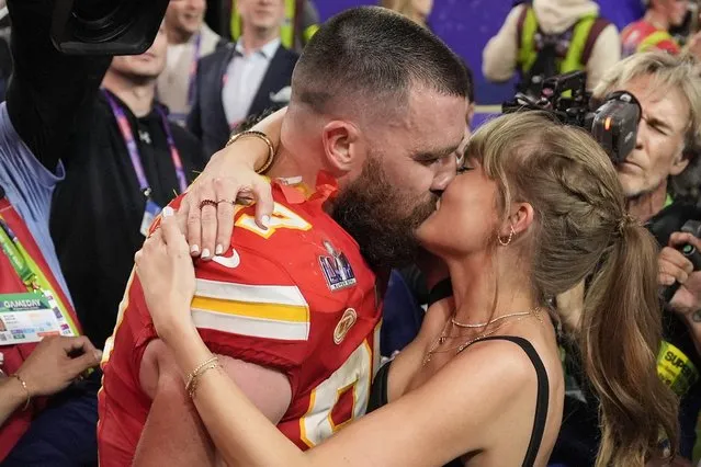Kansas City Chiefs tight end Travis Kelce (87) kisses Taylor Swift after the NFL Super Bowl 58 football game against the San Francisco 49ers, Sunday, February 11, 2024, in Las Vegas. The Chiefs won 25-22. (Photo by John Locher/AP Photo)
