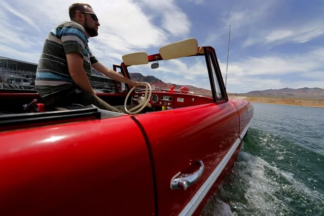 James Spears takes his 1964 German built Amphicar for a drive on Lake Mead in Nevada May 6, 2015. (Photo by Mike Blake/Reuters)