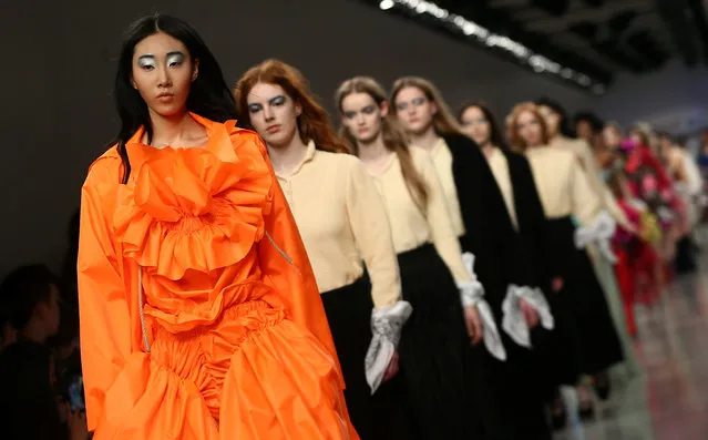 Models present creations at the Central St Martin's catwalk show during London Fashion Week in London, Britain February 17, 2017. (Photo by Neil Hall/Reuters)