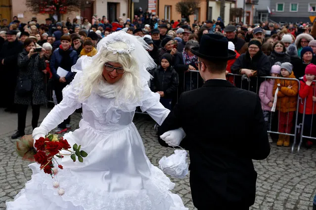 Revellers take part in a traditional event marking the last day of the carnival season called “Kusaki”, a folk party and a re-enactment showing the “defeat of Death” where all roles are played by males, takes place during Shrove Tuesday in the village of Jedlinsk near Radom, Poland February 28, 2017. (Photo by Kacper Pempel/Reuters)