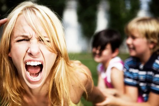 A mom going crazy while playing with her children. (Photo by Brainsil/Getty Images)