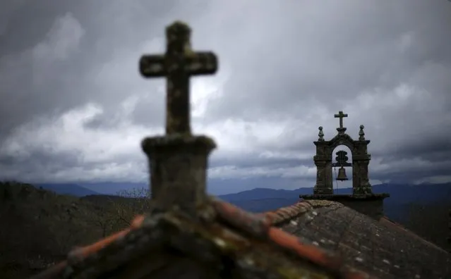 The bell tower of the church is seen in Povoa de Agracoes near Chaves, Portugal, April 19, 2016. (Photo by Rafael Marchante/Reuters)