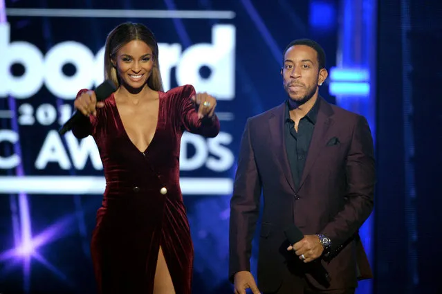 Co-hosts Ciara (L) and Ludacris speak onstage during the 2016 Billboard Music Awards at T-Mobile Arena on May 22, 2016 in Las Vegas, Nevada. (Photo by Kevin Winter/Getty Images)