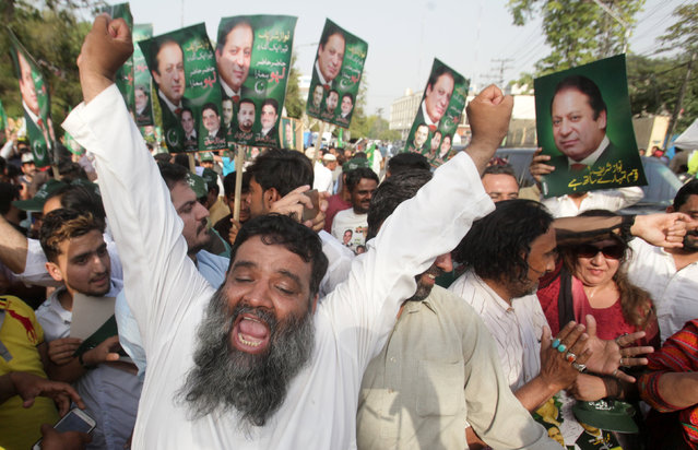 Supporters of Pakistan's Prime Minister Nawaz Sharif celebrate following the Supreme Court's decision in Lahore, Pakistan April 20, 2017. (Photo by Mohsin Raza/Reuters)