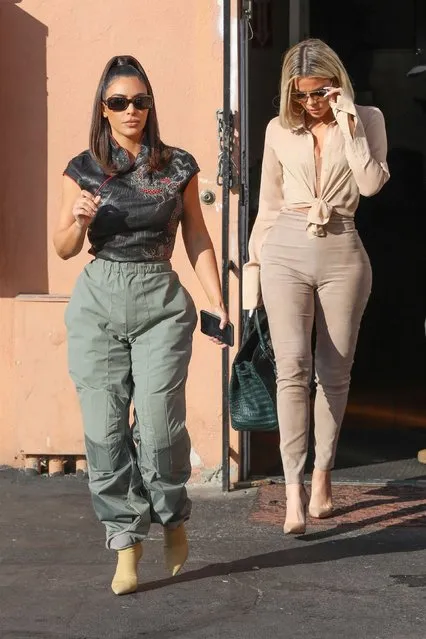 Kim Kardashian and Khloe Kardashian leave Emilio's Trattoria after lunch in Encino, CA. on January 16, 2020. Kim and Khloe look trendy in pastel and neutral tones as they leave a restaurant. (Photo by RAAK/Backgrid USA)
